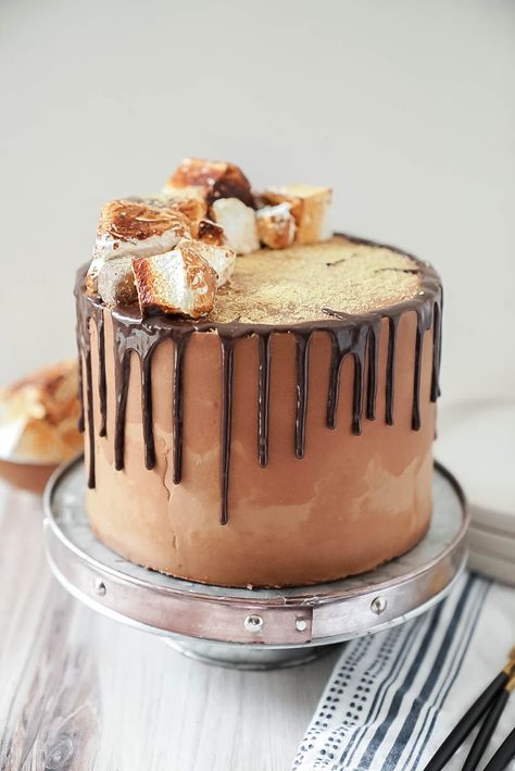 Tasty Graham Cracker S’mores Cake - cake babe Graham Cracker Smores, Dark Chocolate Buttercream, Cracker Cake, Graham Cracker Cake, Marshmallow Filling, Smores Cake, Keep Your Eyes Open, Warm Chocolate, Marshmallow Fluff