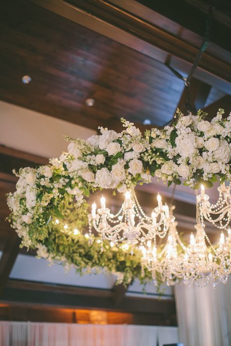 White rose, white hydrangea, white delphinium, white stock, white spray rose - floral chandelier White Flower Chandelier, Wedding Floral Ceiling, Delphinium White, White Spray Rose, White Delphinium, Floral Ceiling, White And Green Wedding, Hydrangea White, White Spray Roses