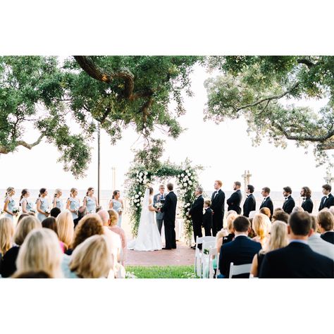 Bride and groom at alter during the ceremony. Bride And Groom With Officiant, Bride And Groom Alter, Groom Waiting For Bride At Alter, Bride And Groom At Alter, Bridal Party Sitting During Ceremony, Ceremony Pictures Wedding, Groom At Alter, Processional Order, Bride And Groom Ceremony