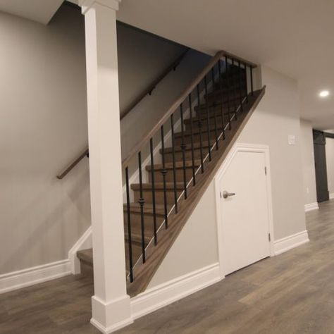 Stairs With Post To Ceiling, Basement Stairs Open On One Side, Basement Stairs Open, Opening Staircase Wall, Simple Stairs Design, Stairs Basement Ideas, Basement Stairwell Lighting, Unfinished Basement Stairs, Small Stairs Design