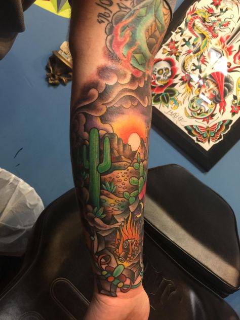 Arrow head in the desert. Done by Jason Bane at Iron Age tattoos St. Louis MO. Southwest Sleeve Tattoo, Desert Tattoo Color, New Mexico Sleeve Tattoo, Desert Shoulder Tattoo, Desert Flower Tattoo Sleeve, Desert Leg Sleeve Tattoo, Desert Theme Sleeve Tattoo, American Traditional Desert Tattoo, Sonoran Desert Tattoo