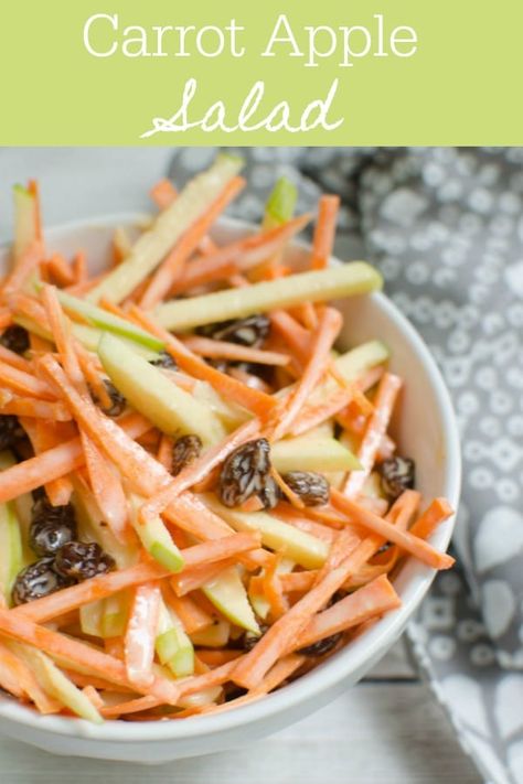 Carrot Apple Salad - sliced carrots and apples with raisins in a sweet and tangy dressing! So easy and so delicious! My kids love this! Carrot Apple Salad, Raisin Salad, Salad Apple, Carrot Raisin Salad, Sliced Carrots, Carrot Salad Recipes, Salad Kale, Carrot Slaw, Apple Salad Recipes