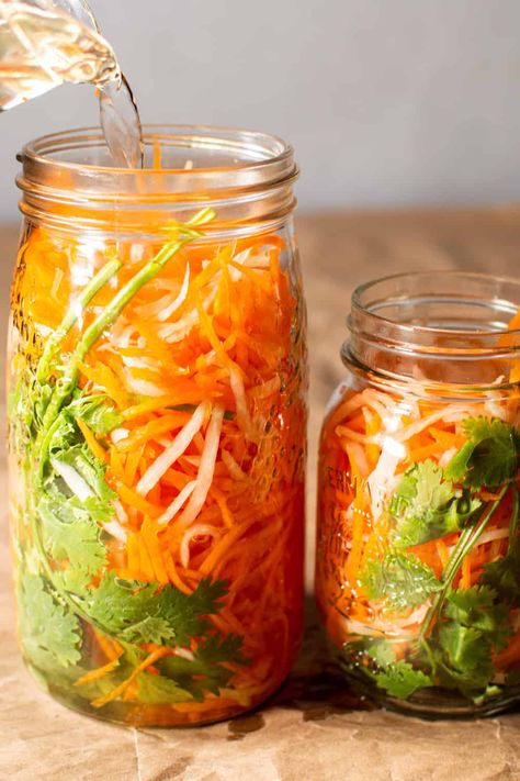 Pickled carrot and daikon radish is a wonderful accompaniment to many dishes. It's fast, easy and keeps in the fridge for several weeks. #pickle #daikon #radish #carrot #easy #pickled