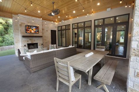 In Texas, there is time year-round for outdoor dining and festivities. This large covered patio space features ample sitting and eating spaces, with entertainment option! From Trent Williams Construction, Tyler, Texas Covered Back Patio Farmhouse, Covered Patio With Dining And Seating Area, Built In Barbeque Ideas Outdoor Living, Large Open Front Porch Ideas, Large Patio Tables Outdoor Living, Shop With Outdoor Living, Outdoor Living Space Covered Patio, Houses With Outdoor Living Spaces, Lanai Dining Ideas