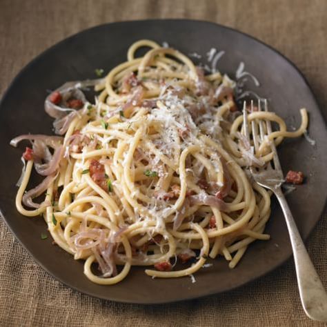 Bucatini with Caramelized Onions and Pancetta | Williams Sonoma Interesting Dinner Ideas, Spaetzle Recipes, Easy Weeknight Pasta, Williams Sonoma Recipes, William Sonoma Recipes, Spaetzle Recipe, Pancetta Recipes, Onion Pasta, Weeknight Pasta