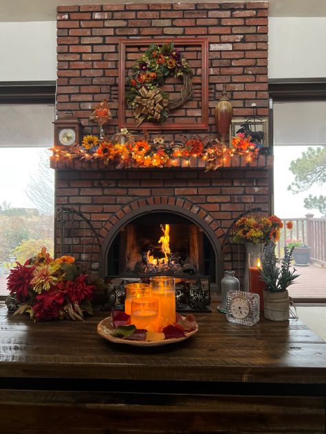 Thanksgiving and fall inspired mantel Thanksgiving Fall Aesthetic, Thanksgiving Aesthetics, Thanksgiving Wallpaper Iphone November, How To Hang Garland On Mantel, Christmas Fireplace Garland, Thanksgiving Napkin Folds, Simple Thanksgiving Table Decor, Aesthetic Thanksgiving, Christmas Garland Mantle