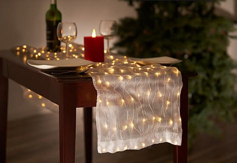 LED Table Runner @ Sharper Image Sheer Table Runner, Fabric Runner, London Gifts, Warm White Led Lights, Platinum Credit Card, Silver Fabric, Holiday Pillows, Led Table, White Led Lights