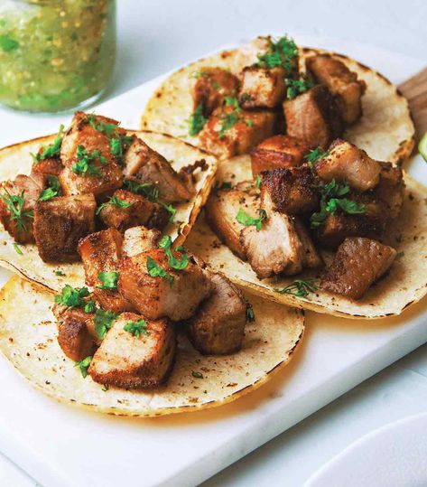 Tacos-meet-pork belly is an explosion of sweet, spicy and salty flavors and you won’t be able to get enough of them. Slow cooked and then fried, chef Robyn Almodovar likes to call these tacos “a party in your mouth.” #tacos #tacotuesday #porkbelly #crispypork Pork Belly Tacos Recipe, Pork Belly Tacos, Ground Beef And Potatoes, Braised Pork Belly, Pork Belly Recipes, Taco Recipe, Clam Recipes, Crispy Pork, Homemade Tortillas