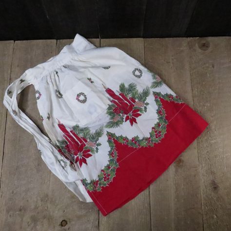 Vintage Christmas Half Apron Mid Century 1950s / 1960s Apron Holly Wreath and Candles Graphics by VintageCreekside on Etsy Apron Decorating Ideas, 1960s Apron, Holly Leaves And Berries, Christmas Apron, Holly Wreath, Christmas Aprons, Vintage Clothes Women, Red Bottom, Holly Leaves