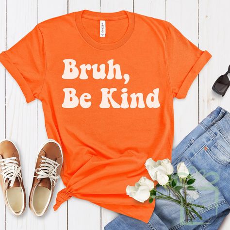 "Spread positivity and combat bullying this Unity day and the entire month of October with our \"Bruh, Be Kind\" t-shirt. This comfortable and durable tee features a unique design that promotes kindness and inclusivity. By wearing it, you're joining a movement to make the world a kinder place. It's a perfect gift and supports anti-bullying initiatives. Get yours today and be part of the change! 👕T-Shirt Details:  Material: 100% cotton Midweight fabric Classic fit Tear-away label Runs true to size Available in sizes Adult X-Small to 5XL and Youth X-Small-X-Large 🛍️Click here to view our entire Awareness Tees Collection: https://www.etsy.com/shop/IAmEncouraged?ref=seller-platform-mcnav§ion_id=42534930" Bully Prevention, Unity Day, Month End, Be Kind Shirt, Spread Positivity, Room Goals, School Events, Kindness Shirts, Kids Graphic Tees