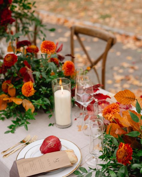 A fall-inspired tablescape at Boscobel featuring vibrant orange and red florals, bread bag menus, a pomegranate place card, and elegant gold flatware. Autumnal Tablescape, Wedding Stationery Timeline, Venue Sketch, Bread Bag, Poughkeepsie Ny, Classic Invitation, Custom Wedding Stationery, Fall Wedding Inspiration, Wedding Needs