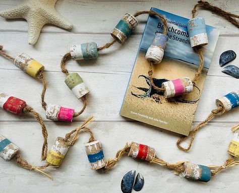 Nautical Cork Buoy Garland ⚓️ | The SeaSalt Shed Cork Garland, Driftwood Houses, Wine Cork Diy Crafts, Wine Cork Diy, Shed Home, Cork Diy, Coastal Beach Decor, Beach Theme Decor, Nautical Wall Art