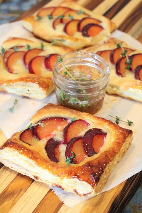 Flakey puff pastry filled with fresh plums, frangipane, and glazed with thyme-infused honey. Plum Frangipane Tart, Puff Pastry Filling, Infused Honey, Whipped Honey, Frangipane Tart, Almond Paste, Puff Pastry, Soul Food, Thyme