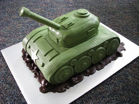 The tank cakes are starting to all look alike. For Z's cake I want to try to bundle the candles at the end of the gun so we can light them. Army Tank Cake, Army Birthday Cakes, Map Cake, Tank Cake, Army Cake, Military Cake, Army Tank, Childrens Birthday Cakes, Boy Birthday Cake