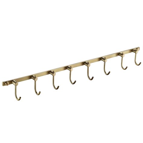 PRICES MAY VARY. BRASS MATERIAL: High quality brass construction, which is stronger than plastic hooks. It can ensure longevity of usage. SPACE SAVING: 6 hooks together for you to hang keys, hats, coats, robes, bags and towels etc. WIDELY USED: Ideal organizer for bathrooms, bedrooms, kitchens, hallways, farmhouses or any other places. ANTIQUE SURFACE: Brushed-brass surface is smooth and delicate, which is anti-rust in daily life. Add an antique style to your room. CONVENIENT INSTALLATION: Wall Front Entry Hooks, Bathroom Wall With Hooks, Bathroom Wall Hooks Ideas, Key Hook Ideas, Entry Way Coat Hook Ideas, Wall Coat Rack Ideas Entryway, Coat Hook Ideas, Bathroom Towel Hook Ideas, Wall Hooks Ideas