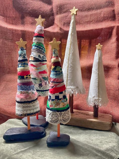 Simple sweet and sustainable! These upcycled fabric scrap Christmas trees are the perfect addition to your rustic cottagecore holiday decorations! Fabric Scrap Christmas Tree, Sewn Christmas Trees, Christmas Textile Decorations, Home Made Xmas Tree Decorations, Decoupage Christmas Tree, Textile Christmas Decorations, Rag Trees How To Make, Scrap Christmas Tree, Fabric Christmas Garland