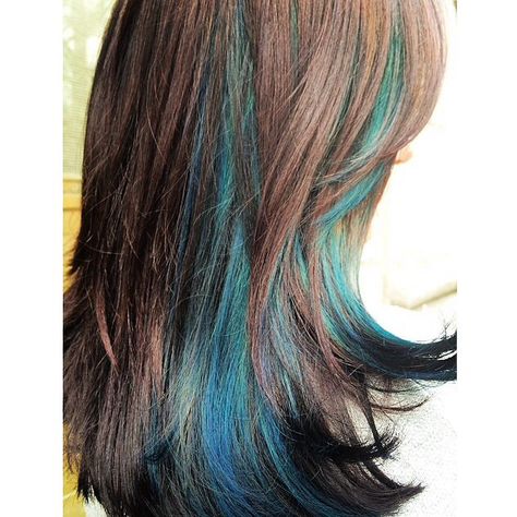 Beautiful brown haircolor with turquoise highlights. Love this look. Brown Hair With Unnatural Highlights, Aqua Peekaboo Hair, Brown Hair Teal Highlights, Blue Streaks Curly Hair, Brown And Aqua Hair, Brown Hair With Turquoise Highlights, Teal Streaks In Brown Hair, Brown And Turquoise Hair, Turquoise Hair Highlights