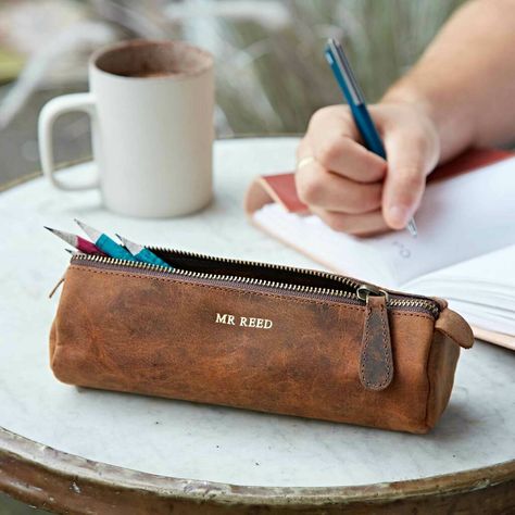 Our unique buffalo leather pencil cases are perfect for any stationery fan to store their favourite essentials, the ideal way to thank your favourite teacher. Large enough to hold all of your essentials and durable enough to make sure they stay protected, it is an all-around perfect personalised pencil case. The durable buffalo leather will only ever get better with age as every scratch, mark and blemish eventually blends into the natural tone of the case to produce something that will not only Personalised Pencil Case, Favourite Teacher, Teacher Gift Ideas, Personalized Pencil Case, Leather Pencil Case, Assistant Gifts, Presents For Teachers, Teaching Assistant, Fabric Journals