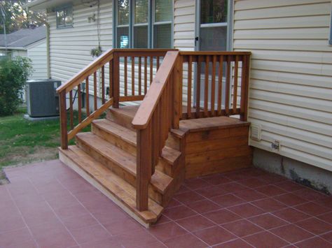 While this homeowner wanted a very small deck off the back, the new outdoor tile dressed the yard up nicely. Porch With Steps, Small Deck Ideas On A Budget, Deck With Steps, Small Deck Ideas, Backyard Deck Ideas On A Budget, Deck Ideas On A Budget, Small Backyard Decks, Deck Wood, Sun Deck