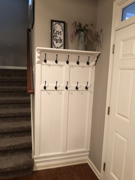 Front Entryway Hook Ideas, Mud Room Decor Entry Ways, Foyer Hooks Entrance, Jacket Hooks Entryway, L Shape Entryway Ideas, Small Entryway Accent Wall Ideas, Entry Hook Wall, Coat Hook Wall Ideas, Small Hallway Coat Storage