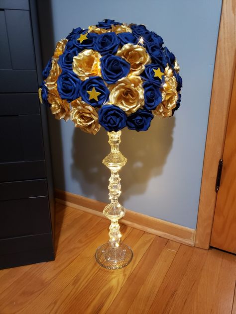 Royal Blue Black And Gold Quince, Gold And Royal Blue Centerpieces, Navy Blue Gold Centerpieces, Dark Blue And Gold Centerpiece, Royal Blue And Gold Quinceanera Tables, Royal Ball Centerpieces, Dark Blue Quinceanera Centerpieces, Gold And Navy Centerpieces, Quince Table Centerpieces Blue