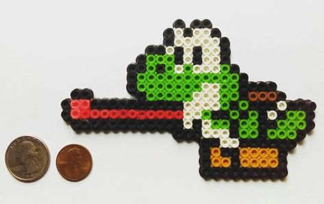 Yoshi Perler Bead | Perler bead art, Perler beads, Perler bead patterns Mario Perler Beads, Perler Bead Mario, Perler Ideas, Fuse Bead Patterns, Perler Bead Templates, Perler Crafts, Melting Beads, Iron Beads, Pixel Art Pattern