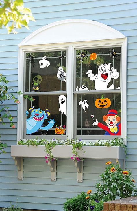 Halloween Window Decorations Ghosts, black cats, witches, skeletons, and monsters seem to be peeking and saying “HAPPY HALLOWEEN” to you during this spooky time. 
This image may contain a link to an affiliate website Door Halloween Decorations, Witch Skeleton, Halloween Window Clings, Black Cat Witch, Halloween Window, Halloween Door Decorations, Halloween Candles, Halloween Ornaments, Window Clings