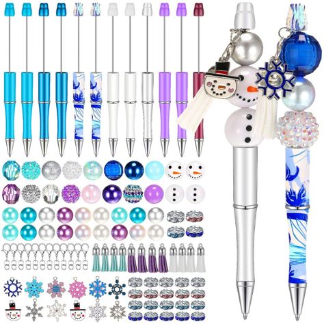 PRICES MAY VARY. Meet Your Requirements: there will be 12 pieces of office supplies pens in 6 different colors, 12 pieces of tassels, 12 clip rings, 12 snowflake element related pendants, 38 acrylic beads and 32 small crystal spacer beads; Abundant quantity with multiple design designs are suitable for DIY making and enough to use Nice Workmanship: beads for pens are made of quality wood, loose spacer beads are made of crystal, sturdy and reliable, beaded pens are made of reliable plastic materi Beaded Pen Holder Necklace, Pen Beads, Students Gifts, Bead Pens, Bulk Gifts, Beadable Pens, Beaded Pens, Tree Craft, Christmas Tree Crafts