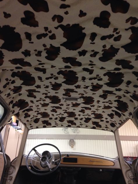 Faux cowhide headliner Truck Interior Ideas Diy, Country Truck Interior Ideas, Head Liner Ideas For Trucks, Cowhide Truck Interior, Western Truck Interior Ideas, Truck Headliner Ideas, Car Headliner Ideas, Cow Print Truck Interior, Western Truck Interior