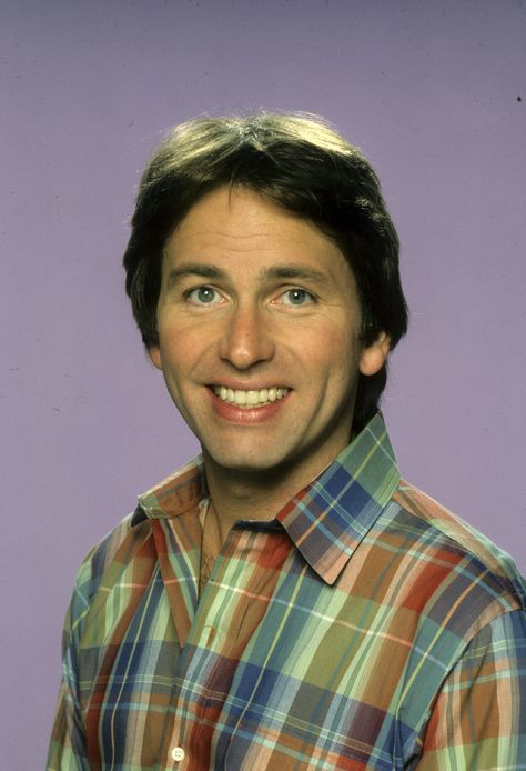 1980s Sitcom Stars | It's hard not to miss such beloved 80s TV stars as John Ritter and Gary Coleman. Three’s Company, John Ritter, 1980s Nostalgia, Top Tv Shows, Bernadette Peters, Three's Company, Actor John, People Of Interest, Michael Keaton