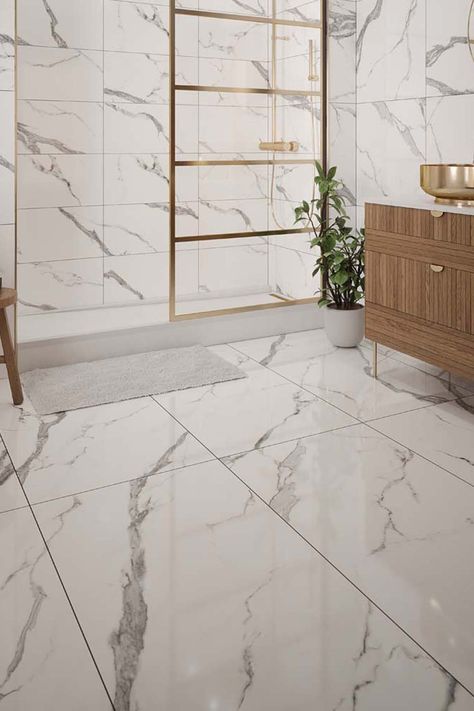 Introducing Hera, a stunning polished marble effect that exudes classical elegance. Make a statement with the supersized 600x1200mm tile, whilst classic 300x600mm and 600x600mm are perfect for adding a touch of luxury in any space. Gold Bra, White Marble Tiles, Modern Bathrooms, Open Plan Living Room, Calacatta Marble, Outdoor Tiles, Modern Vanity, Kitchen Doors, Marble Bathroom