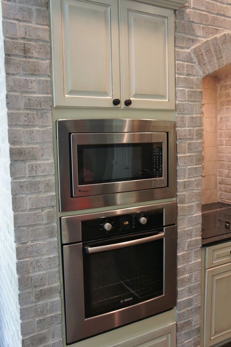 brick painted with Annie Sloan Chalk paint mixed 3 parts water to 1 part paint and then highlighted Things Paint, Kitchen Painting, Interesting Interiors, Brick Kitchen, Paint Kitchen, Painting Kitchen, George Nelson, Fireplace Makeover, Painted Brick