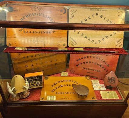 Witch Board Museum Baltimore – Baltimore, Maryland - Atlas Obscura Paper Botanicals, Soft Circuits, Small Museum, Witch Board, E Textiles, Fantasy Village, Globe Theater, Western Town, Atlas Obscura