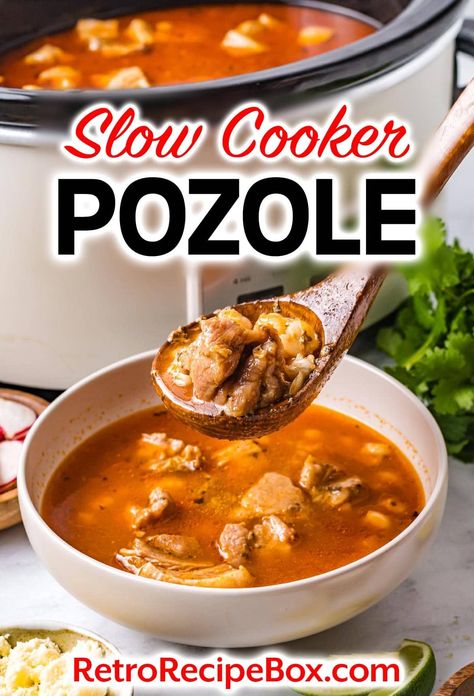 Slow Cooker Pozole is rich pozole with a rich broth made with chilis, this is made simpler with a delicious red enchilada sauce. You will be sure to please your family with the flavorful Posole soup full of tender pork and hominy. retrorecipebox.com hominy recipe, Mexican soup recipe, pork stew Easy Crockpot Pozole Recipe, Pozole Soup Mexican Posole, Easy Crockpot Posole, Pasole Recipe Slow Cooker, Pazole Soup Mexican Posole Pork Green, Red Chile Posole, Crockpot Posole Pork Slow Cooker, Crockpot Pazole Recipe, Posole Recipe Pork Easy