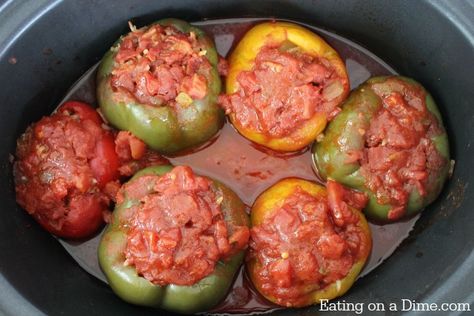 Need an easy crock pot recipe? Try this delicious Crock pot Stuffed Peppers recipe that is better than the traditional stuffed peppers recipe. Crock Pot Stuffed Peppers, Ground Beef Crockpot Recipes, Slow Cooker Ground Beef, Crockpot Stuffed Peppers, Slow Cooker Stuffed Peppers, Eating On A Dime, Meatless Main Dishes, Crockpot Recipes Beef, Crockpot Beef