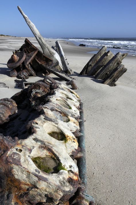 Skeleton Coast in Namibia. Part of a shipwreck on the Skeleton Coast in Namibia #Sponsored , #Advertisement, #Ad, #Coast, #Part, #Namibia, #Skeleton Namibia Travel, Fallout Rpg, Luxury Lodge, Shipwreck, Southern Africa, Skeleton, Travel Destinations, National Parks, Stock Photos