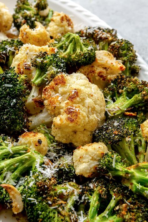 This easy sheet pan roasted broccoli and cauliflower with parmesan, breadcrumbs, and garlic is quick and delicious! #broccoli #cauliflower #sidedish #vegetables #vegetarian #Weightwatchers #healthyrecipes Pan Roasted Broccoli, Broccoli Cauliflower Recipes, Roasted Broccoli And Cauliflower, Roasted Broccoli Recipe, Delicious Broccoli, Broccoli Cauliflower Salad, Broccoli And Cauliflower, Easy Vegetable Side Dishes, Cauliflower Dishes