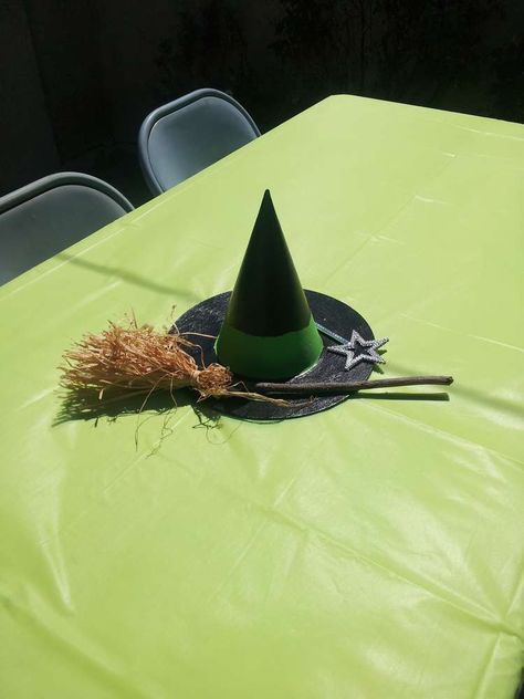 Wicked/Wizard of OZ Birthday Party Ideas | Photo 3 of 25 | Catch My Party Wizard Of Oz Table Centerpieces, Wicked Musical Birthday Party, Wicked Centerpiece, Wizard Of Oz Centerpieces, Wicked Birthday Party, Camping Theme Wedding, Emerald City Party, Wicked Birthday, Wizard Of Oz Party Ideas