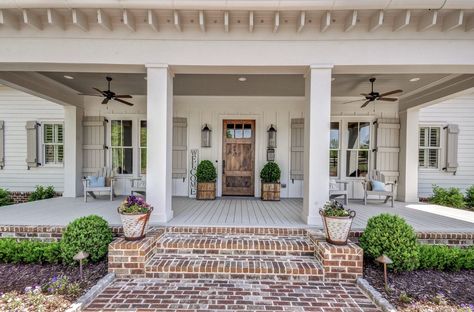 Farmhouse front porch design #frontporch #farmhousestyle #farmhousedesign Modern Farmhouse Columns, White House With Wood Pillars, Front Porch Floors Ideas, Front Porch Column Ideas Farmhouse, Two Step Front Porch, Farmhouse Exterior Entryway Ideas, Tan Farmhouse Exterior, Brick Steps Front Porch Entrance, White House Front Porch