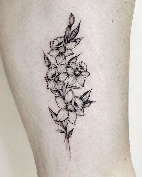 101 Amazing Daffodil Tattoo Designs You Need To See! | Outsons | Men's Fashion Tips And Style Guide For 2020 Mens Daffodil Tattoo, Daffodil Floral Tattoo, Daffodil Tattoo Arm Half Sleeves, Daffodil Half Sleeve Tattoo, Daffodil Compass Tattoo, Daffodil Sketch Tattoo, Bumble Bee And Daffodil Tattoo, Black And Grey Daffodil Tattoo, Daffodil Tattoo Ribs