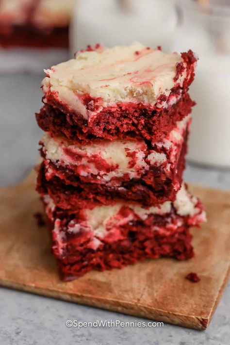 For a sweet surprise that is so quick and easy to make, try these chewy and delicious Red Velvet Cheesecake Brownies. It's a recipe that is so simple to make, just mix up a box cake and swirl it with an easy cheesecake filling to give it a marble look. This irresistible baking will be ready for any use. Serve it as a dessert bar, or pop one into a lunch box. Top with some whipped cream or caramel sauce. #easycakemixes #easyrecipe #redvelvetcheesecakebrownies #spendwithpennies Red Velvet Box Cake Recipe, Puff Pastry Tart Recipes, Pastry Tart Recipes, Easy Red Velvet Cheesecake, Red Velvet Cake Mix Recipes, Easy Red Velvet Cake, Red Velvet Cheesecake Cake, Cake Mix Bars, Red Velvet Cheesecake Brownies