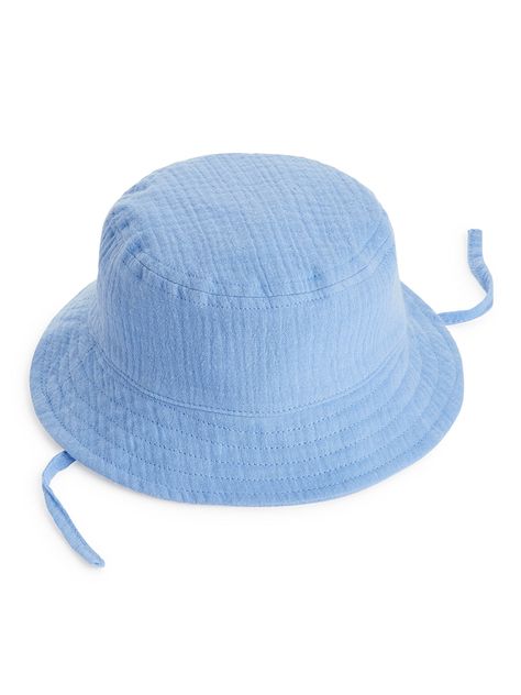 Bucket hat made from a soft cotton muslin weave. String to tie under neck. World Crafts, Cotton Muslin, Muslin Cotton, Everyday Bag, Jean Leggings, Hat Making, Bucket Hat, H&m, Lounge Wear