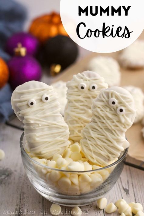 Mummy Cookies are so easy to make and so fun to eat especially with the kids. All you need is 4 simple ingredients to make these fun Halloween cookies. These are one of my favorite Halloween cookies I have made so far! Mummy Treats, Mummy Cookies, Easy Craft Ideas For Kids, Candy Eyes, Perfect Halloween Party, Spooky Snacks, Nutter Butter Cookies, Spooky Food, Halloween Party Snacks