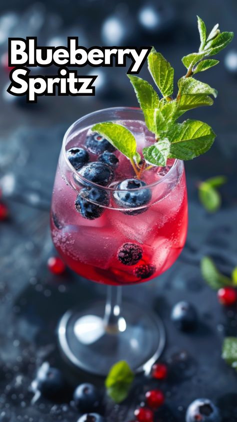 Whipping up a Blueberry Spritz is always a pleasure, especially on those warm afternoons when you want something refreshing and a bit fruity. The combination of fresh blueberries with a splash of lemon brings out a lovely tartness, balanced nicely by a hint of sweetness from the syrup. #blueberryspritz #blueberrycocktails via @mybartender Blueberry Prosecco Cocktails, Blueberry Cocktails, Blueberry Sangria, Smirnoff Recipes, Spritz Cocktails, Spritz Drink, Blueberry Basil, Blueberry Cocktail, Water Cocktails