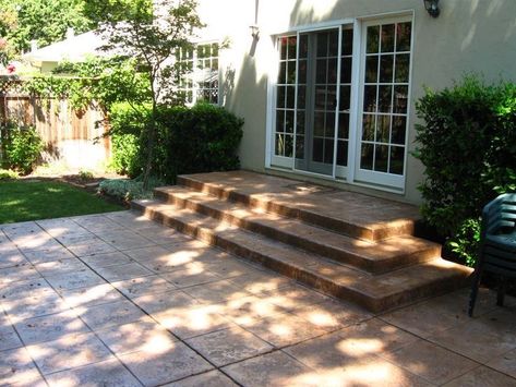 Concrete Raised Patio, Poured Concrete Patio Ideas, Raised Patio Ideas, Cement Stairs, Poured Concrete Patio, Diy Concrete Patio, Concrete Patio Ideas, Patio Stairs, Back Patio Ideas