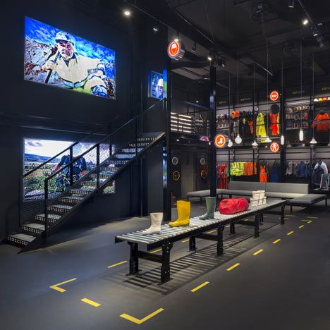 Boutique for a safety equipment brand in Singapore by Ministry of Design. Bulkhead Doors, Workwear Store, Modern Warehouse, Warehouse Design, Interior Design Singapore, Showroom Design, Retail Interior, Retail Store Design, Gym Design