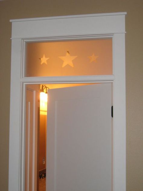 Our master bath door will look like this - minus the stars - just clear glass. I might add a pane grid later but for now just want clear glass. Above Door Window, Window Above Door, Yellow Farmhouse, Borrowed Light, Interior Railings, Interior Design Colleges, Black Interior Doors, Dormer Windows, Transom Windows