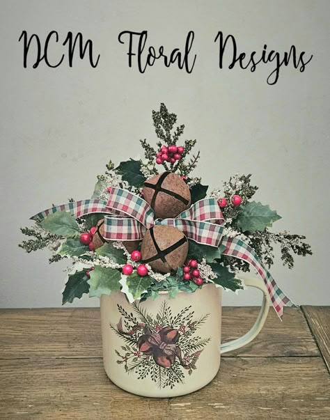 Christmas Coffee Mug Centerpiece, Christmas Mug Arrangement, Mug Arrangements, Teacup Decorations, Coffee Mug Floral Arrangement, Evergreen Centerpieces, Tea Cup Flower Arrangements Christmas, Tin Can Christmas Flower Arrangements, Coffee Mug Christmas Floral Arrangement