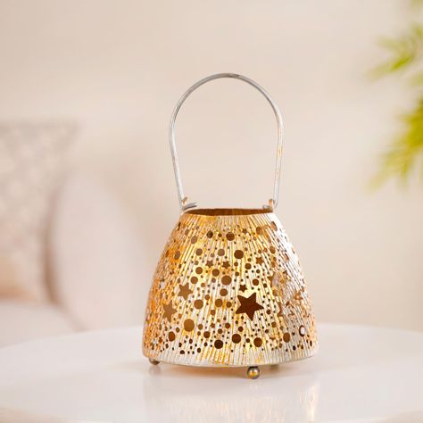 Shine bright like a lantern! 🏮✨ Turn your home into a haven of glowing warmth and sophisticated style. 🛍️🌟🕯️ Products included: 1. Stars And Moon Festive Metal Lantern With Handle 2. Navy Blue Moroccan Candle Holder Lantern Set Of 2 3. Moroccan Decorative Metal Lantern Sage Green 4. Geometric Cutwork Lantern Lavender Set Of 2 5. Set Of 2 Festive Charm Lanterns With Metal Cutwork #lanterns #metallanterns #decor #eid #eidhomedecor #homestyling #ironlantern #tealights #tealightholder #homees... Moroccan Candle Holder, Candle Holder Lantern, Iron Lanterns, Lantern Set, Metal Lanterns, Decorative Metal, Colorful Candles, Lantern Candle Holders, Tea Light Holder