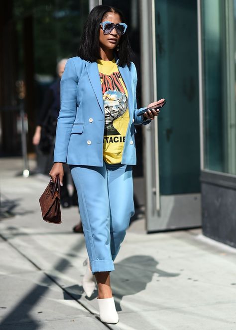 6 Genius Ways to Style a Graphic Tee #purewow #outfit ideas #fashion #shopping #shoppable Style A Graphic Tee, Blazer Ideas, Graphic Tshirt Outfit, Spring Blazer, Walking Down The Street, Graphic Tee Style, Graphic Tee Outfits, Tee Outfit, Tshirt Outfits